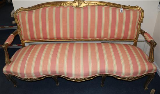 A French giltwood settee, W.173cm